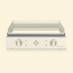 Mise en avant du bac récupérateur de graisse de la plancha vivaplancha, le reste de l’appareil étant volontairement estompé.